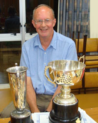 Paul Garbett with the Club Championship and Rapid Championship trophies